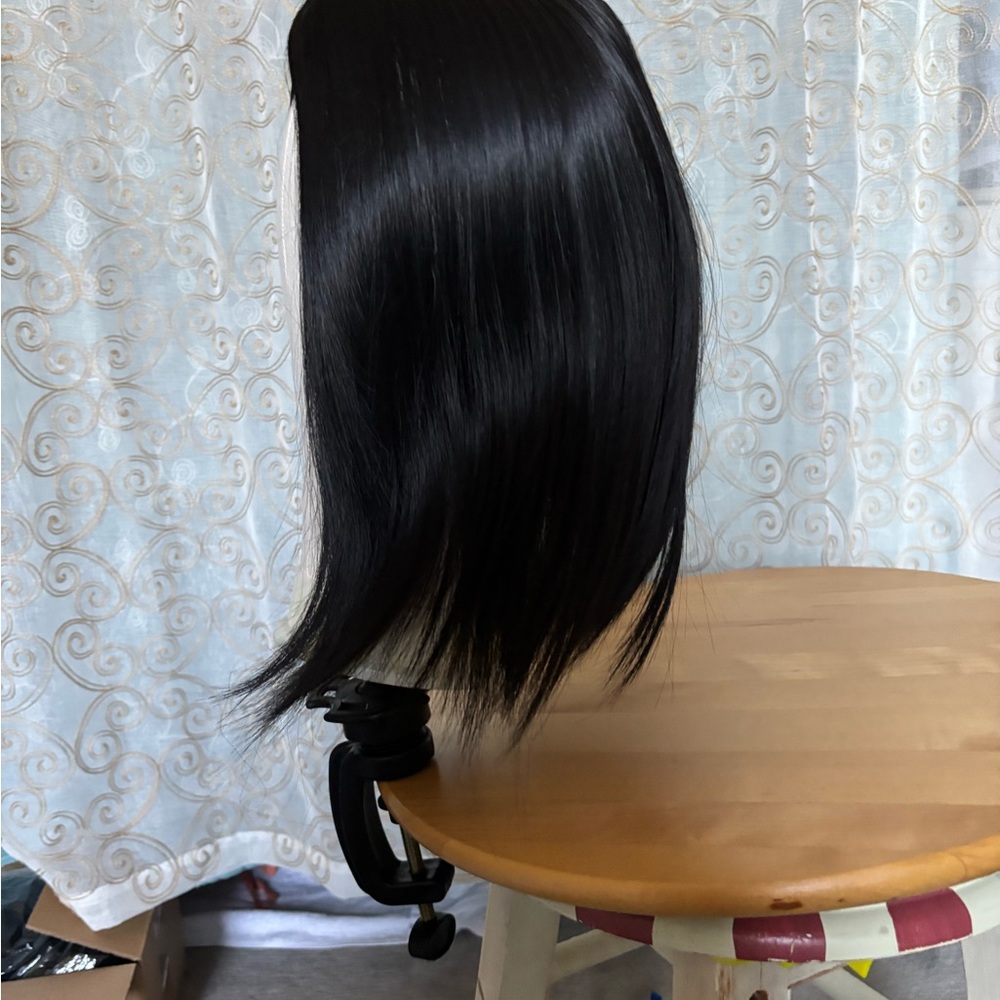 Sleek Black synthetic hair topper
Brand new 
12 to 14 inches 
Light volume